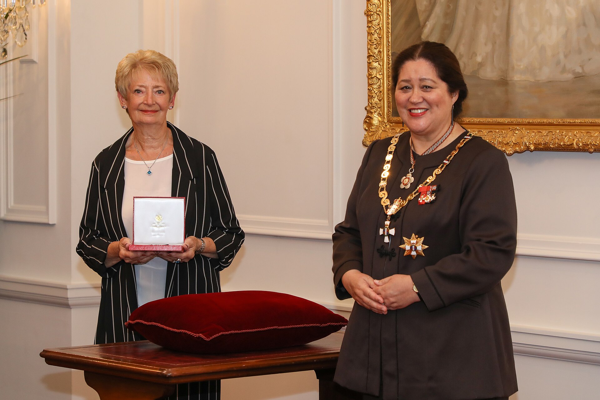 Yvonne Officer (left), after being presented with the Queen's Service Medal, for services to victim support, by the governor-general, Dame Cindy Kiro, at Government House, Wellington, on 7 December 2021.