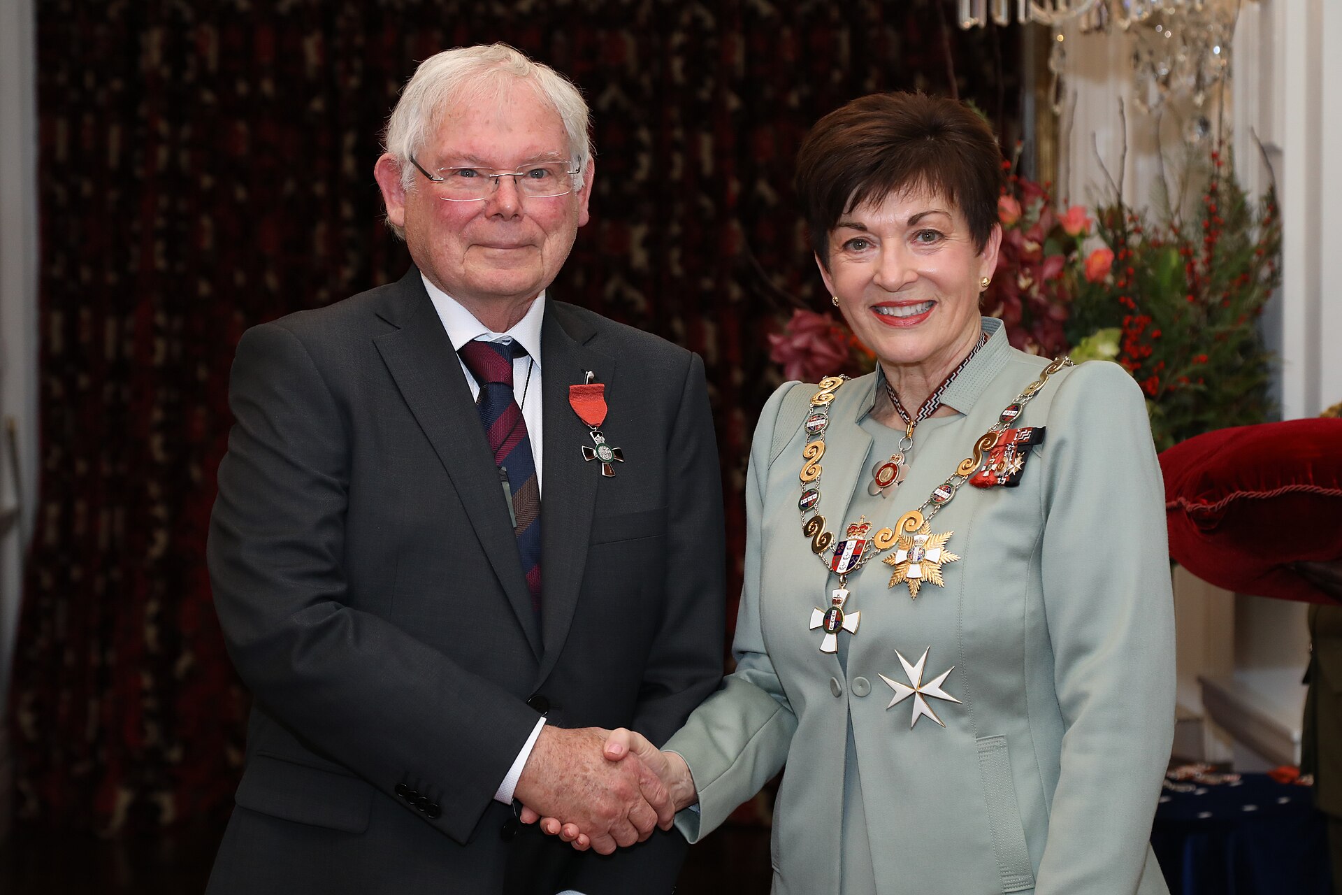 Peter Barker (left), after his investiture as MNZM, for services to the community, by the governor-general, Dame Patsy Reddy, at Government House, Wellington, on 6 July 2020.